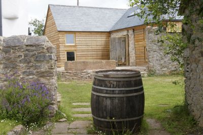Orchard Barn House with barrel
